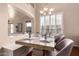 Charming dining room featuring a beautifully set table and seating, perfect for creating memorable dining experiences at 6512 W Eagle Talon Trl, Phoenix, AZ 85083
