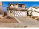 Two-story house with a two-car garage and driveway at 6512 W Eagle Talon Trl, Phoenix, AZ 85083