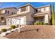 Two-story house with a two-car garage and landscaped yard at 6512 W Eagle Talon Trl, Phoenix, AZ 85083