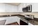 Kitchen with stainless steel appliances and granite countertops at 6512 W Eagle Talon Trl, Phoenix, AZ 85083