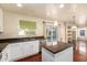 Kitchen with island, stainless steel appliances, and hardwood floors at 6512 W Eagle Talon Trl, Phoenix, AZ 85083