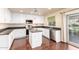 Updated kitchen, stainless steel appliances, island, and backyard access at 6512 W Eagle Talon Trl, Phoenix, AZ 85083