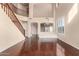 Two story living room with hardwood floors and high ceilings at 6512 W Eagle Talon Trl, Phoenix, AZ 85083