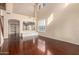 Spacious living room with hardwood floors and high ceilings at 6512 W Eagle Talon Trl, Phoenix, AZ 85083