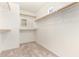 Spacious walk-in closet with double hanging rods and shelving at 6512 W Eagle Talon Trl, Phoenix, AZ 85083
