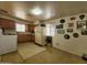 Galley kitchen with wood cabinets and appliances at 6616 N 54Th Dr, Glendale, AZ 85301