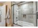 Clean bathroom with a shower/tub combo and contemporary tile at 7131 E Rancho Vista Dr # 3002, Scottsdale, AZ 85251