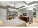 Bright bedroom with a king-size bed and city views at 7131 E Rancho Vista Dr # 3002, Scottsdale, AZ 85251