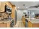 Modern kitchen with stainless steel appliances and granite counters at 7131 E Rancho Vista Dr # 3002, Scottsdale, AZ 85251