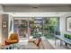 Living area with large windows and views of courtyard at 7131 E Rancho Vista Dr # 3002, Scottsdale, AZ 85251