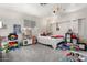 bedroom with window, grey carpet, toys, play kitchen, and themed decor at 9120 E Dennis St, Mesa, AZ 85207