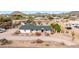 Charming single-story home with manicured landscaping and desert surroundings at 9120 E Dennis St, Mesa, AZ 85207