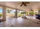 Covered patio featuring multiple ceiling fans, concrete flooring and backyard views at 9120 E Dennis St, Mesa, AZ 85207