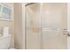 Bathroom with shower, toilet, and towel rack, providing essential features at 9270 E Mission Ln # 111, Scottsdale, AZ 85258