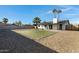 Spacious backyard with gravel and artificial turf at 10001 N 87Th Ln, Peoria, AZ 85345