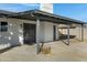 Covered patio with concrete flooring and cactus plants at 10001 N 87Th Ln, Peoria, AZ 85345