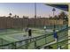 Community pickleball courts with players enjoying a game at 10048 E Emerald Dr, Sun Lakes, AZ 85248