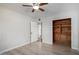 Bedroom with wood-look flooring and access to bathroom at 1061 W 5Th St, Mesa, AZ 85201