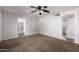 Bedroom with neutral carpeting and built-in shelving at 1061 W 5Th St, Mesa, AZ 85201