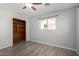 Bedroom with wood-look flooring and large closet at 1061 W 5Th St, Mesa, AZ 85201