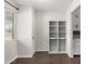 Dining area with built-in shelving and tile floor at 1061 W 5Th St, Mesa, AZ 85201