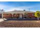 Brick house with a well-maintained front yard at 1061 W 5Th St, Mesa, AZ 85201