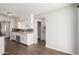 Eat-in kitchen with white cabinets and gray tile floor at 1061 W 5Th St, Mesa, AZ 85201