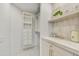 Well-organized closet with built-in shelving and drawers at 10639 E Fernwood Ln, Scottsdale, AZ 85262