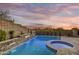 Resort-style pool and spa with water features at 10639 E Fernwood Ln, Scottsdale, AZ 85262