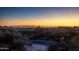 Aerial view of property showcasing desert landscape and sunset at 26325 N 107Th Way, Scottsdale, AZ 85255