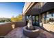 Charming courtyard with fountain statue and terracotta tile flooring at 26325 N 107Th Way, Scottsdale, AZ 85255