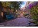 Welcoming entryway with stairs, a blue bench, and desert landscaping at 26325 N 107Th Way, Scottsdale, AZ 85255