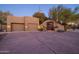 Two-car garage and gated entry to a beautiful home at 26325 N 107Th Way, Scottsdale, AZ 85255