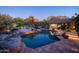 Stunning pool and spa with mountain views at sunset at 26325 N 107Th Way, Scottsdale, AZ 85255