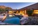 Expansive pool and spa area with outdoor lighting at 26325 N 107Th Way, Scottsdale, AZ 85255