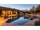 Resort-style pool and spa with patio and lighting at 26325 N 107Th Way, Scottsdale, AZ 85255