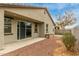 Backyard patio with sliding glass door access at 1094 S 151St S Ln, Goodyear, AZ 85338