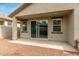 Backyard patio with sliding glass doors and small yard at 1094 S 151St S Ln, Goodyear, AZ 85338