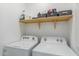 Bright laundry room with Whirlpool washer and dryer at 1094 S 151St S Ln, Goodyear, AZ 85338