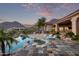 Stunning backyard oasis with a pool, spa, and mountain views at 11510 E Mirasol Cir, Scottsdale, AZ 85255