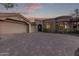 Luxury home with three-car garage and paver driveway at 11510 E Mirasol Cir, Scottsdale, AZ 85255