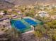 Community tennis courts with mountain backdrop at 11510 E Mirasol Cir, Scottsdale, AZ 85255