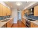 Well-lit kitchen with stainless appliances and ample cabinet space at 1219 E Seldon Ln, Phoenix, AZ 85020