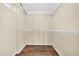 Spacious walk-in closet with wire shelving at 12451 N Cherry Hills E Dr, Sun City, AZ 85351