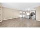 Modern kitchen with white cabinets, gray island, and stainless steel appliances at 12451 N Cherry Hills E Dr, Sun City, AZ 85351