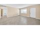 Living room with tile floors and a view into the kitchen at 12451 N Cherry Hills E Dr, Sun City, AZ 85351