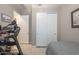 Bedroom with a treadmill and built-in closet at 1255 N Arizona Ave # 1109, Chandler, AZ 85225