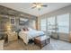 Main bedroom with wood-look walls and en-suite bathroom at 1255 N Arizona Ave # 1109, Chandler, AZ 85225