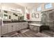 Elegant bathroom with double vanity and soaking tub at 14316 W Circle Ridge Dr, Sun City West, AZ 85375