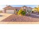 Single-story home with desert landscaping and a two-car garage at 14316 W Circle Ridge Dr, Sun City West, AZ 85375